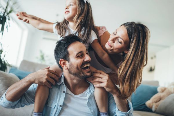 Happy family having fun time together at home