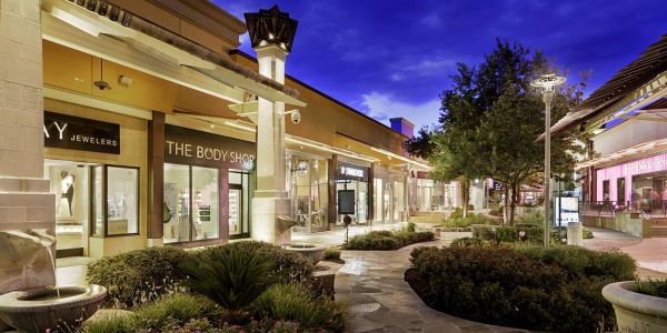 Outdoor shopping plaza in San Antonio, TX near La Calera