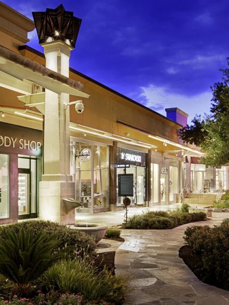 Outdoor shopping plaza in San Antonio, TX near La Calera