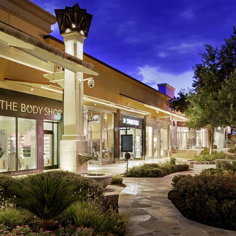 Outdoor shopping plaza in San Antonio, TX near La Calera